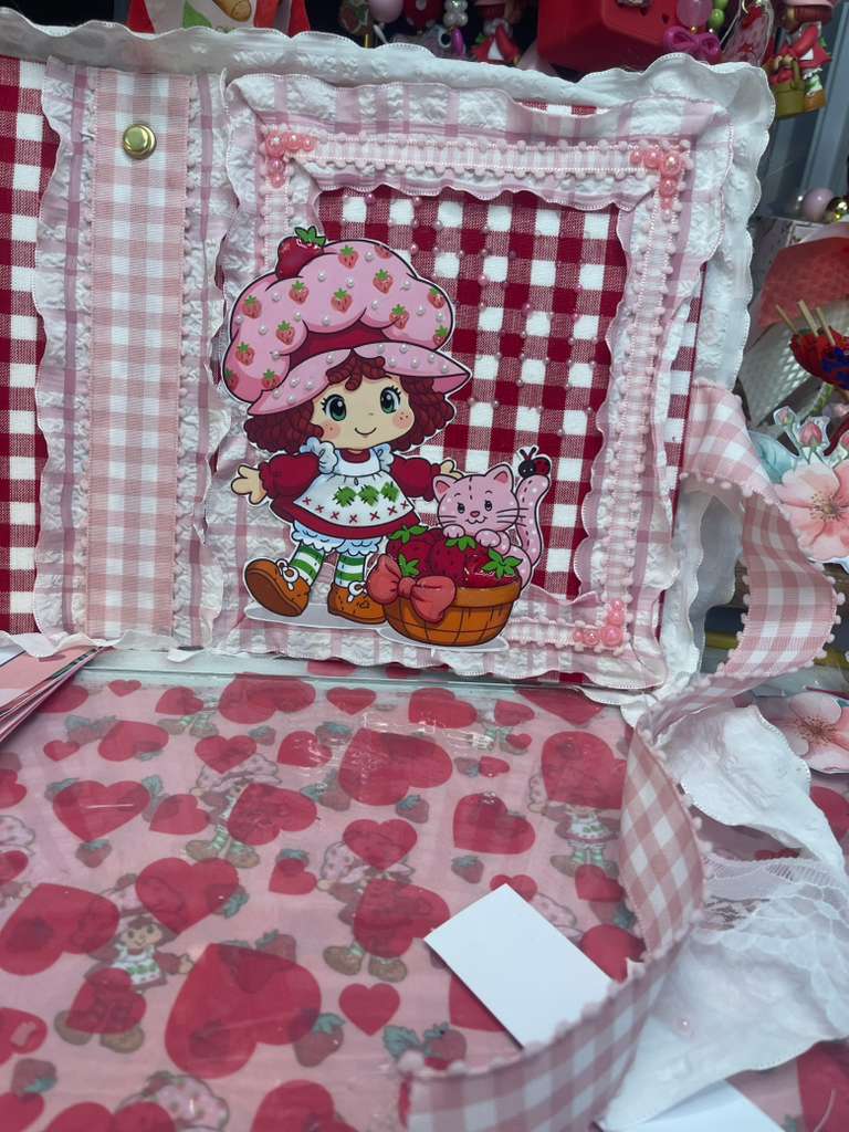 Close-up of the Strawberry Shortcake cover details